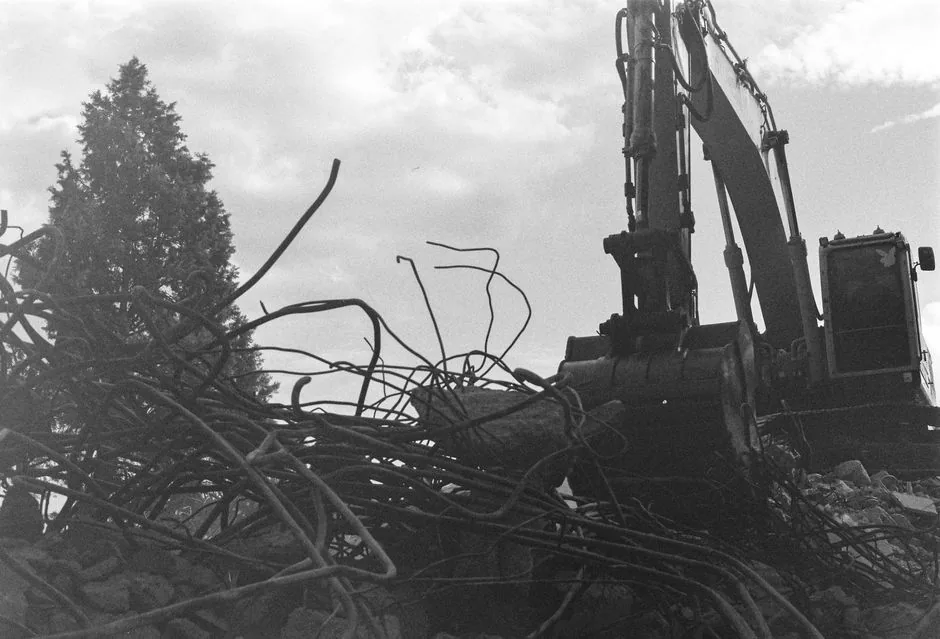 Excavator working at a structure removal site
